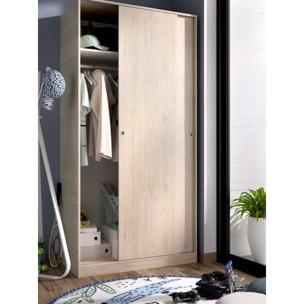 Wardrobe closet measuring 100 x 50 with shelf and hanging rod. Sliding doors to save space.