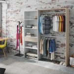 Wardrobe with hanging rails and drawers