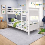 Titan Vicawu white wooden bunk bed in modern kids bedroom with decorative bedding