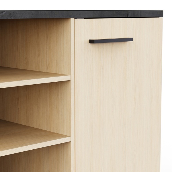 Detail of Keny Vicawu sideboard in light wood with black handles and high-quality modern finish